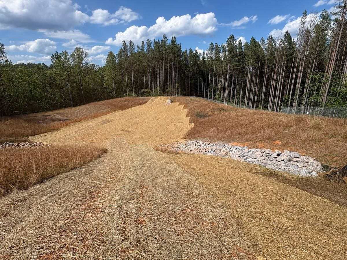 Stabilized sediment basin embankment with riprap outlet protection at the Afton, Virginia solar field