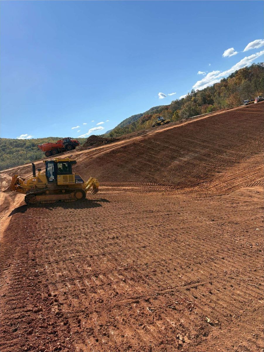 Dozer establishing final grade across a large work area